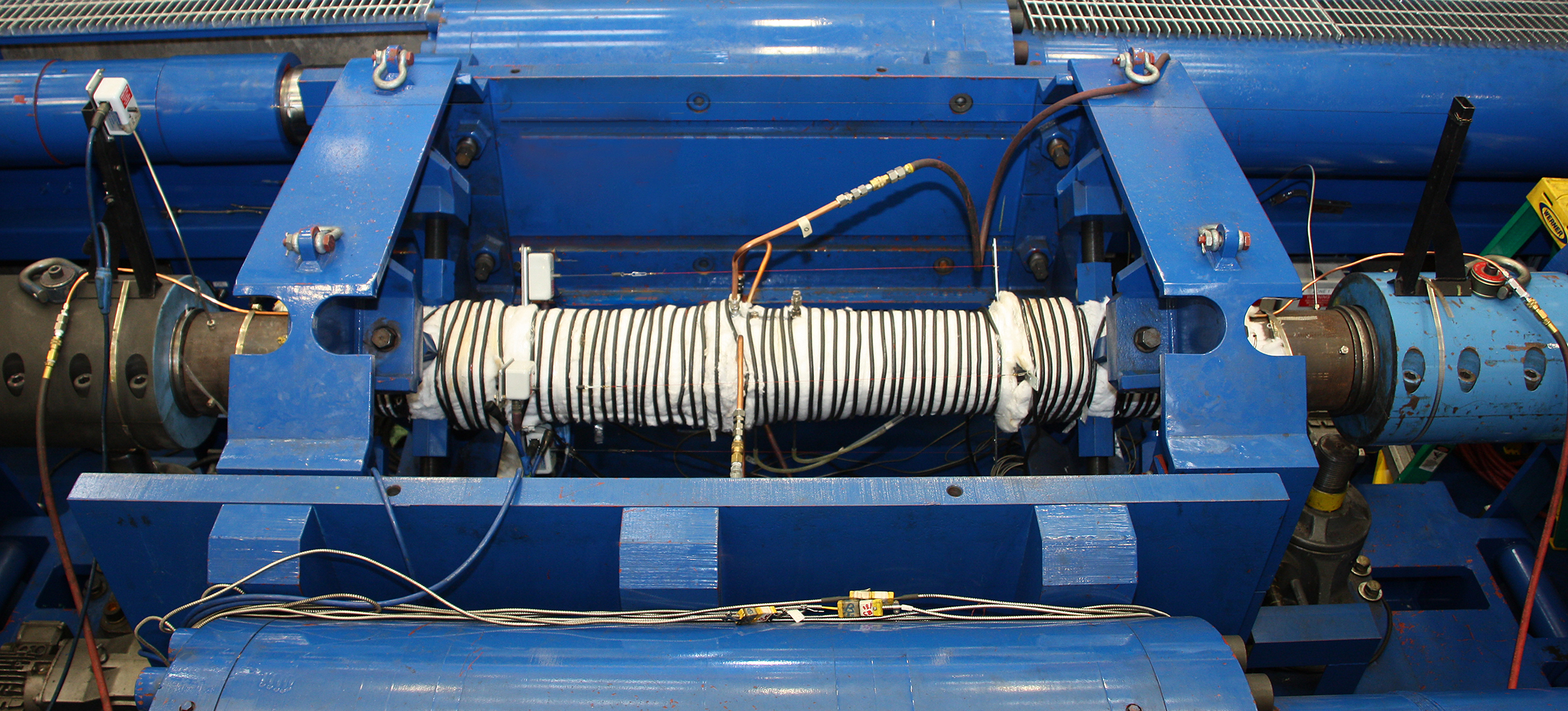 One of Stress Engineering’s Combined Load Test Cells setup for pressure, axial load, and temperature testing