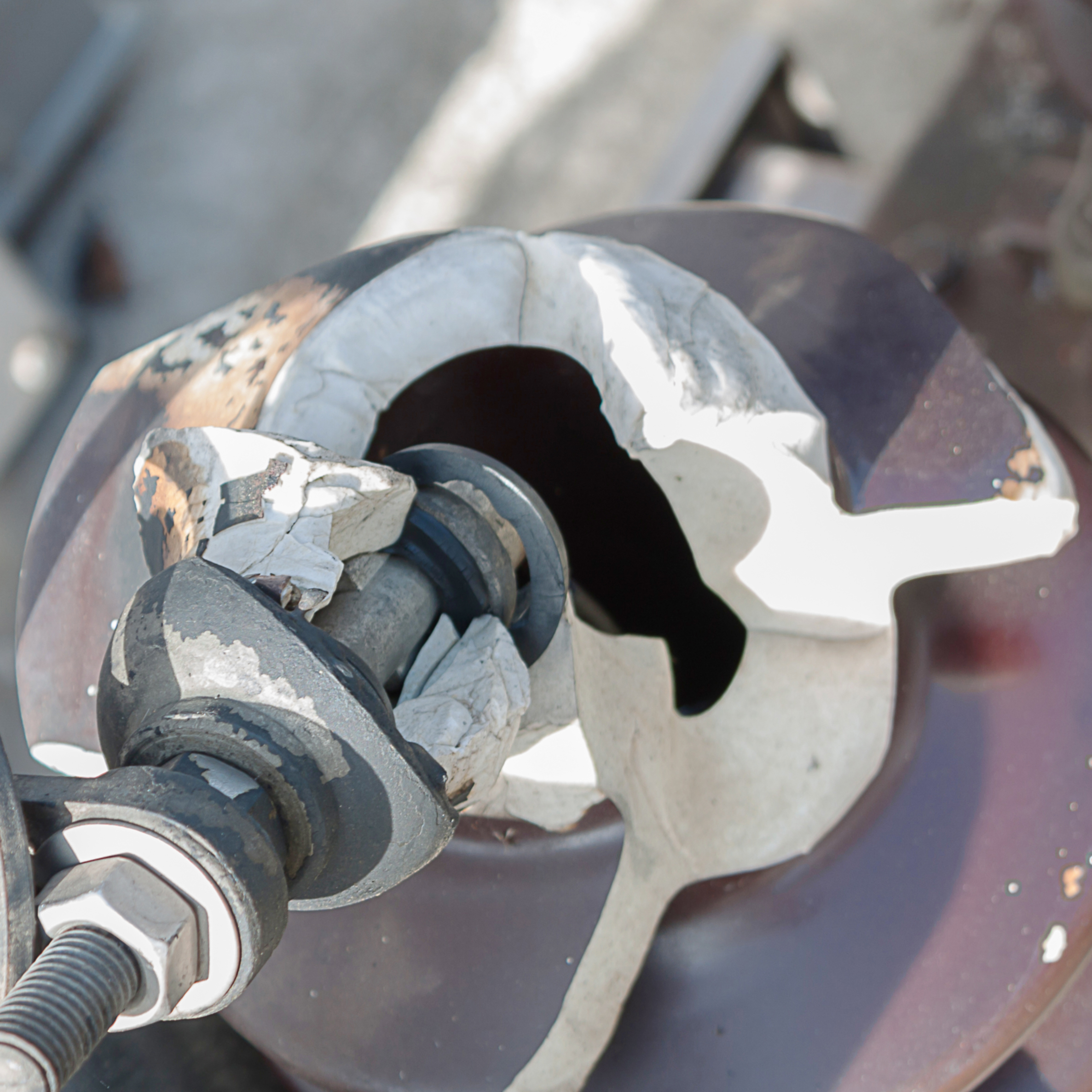 Damaged electrical insulator of old transformer